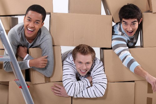 Removal van and moving boxes for a home move in Harringay