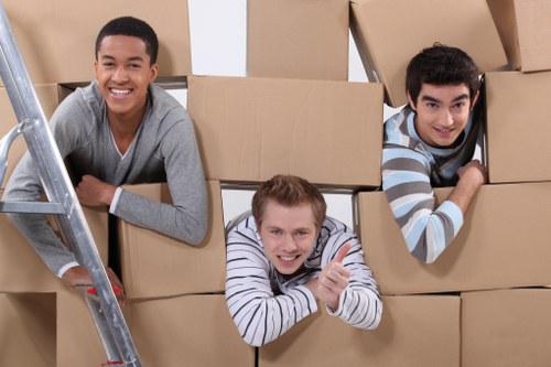 Careful loading of household items into a van for a Harringay removal