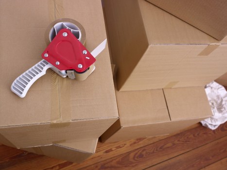 Loading furniture into a removal van in Harringay